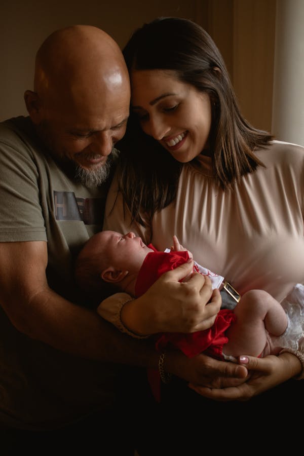 Happy family with newborn baby
