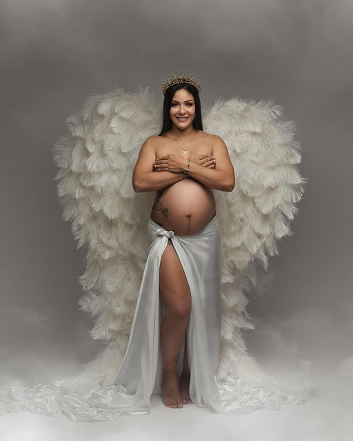 pregnant woman dressed as an angel