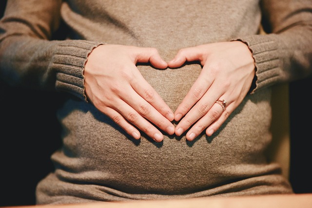 Pregnant belly with heart