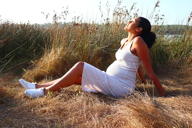 pregnant woman sitting down